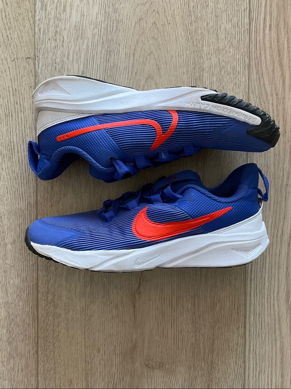 Nike Kids Athletic Sneakers in Blue with Red Swoosh